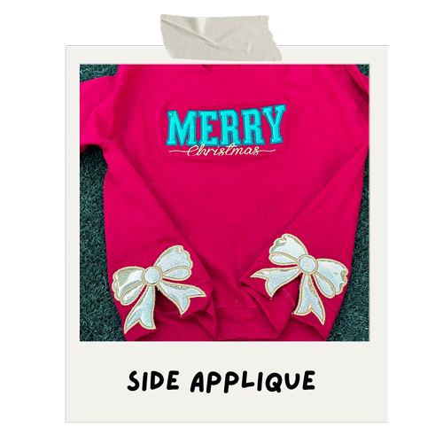 Christmas sweatshirt with side applique bow and 'Merry Christmas' embroidered text in the center